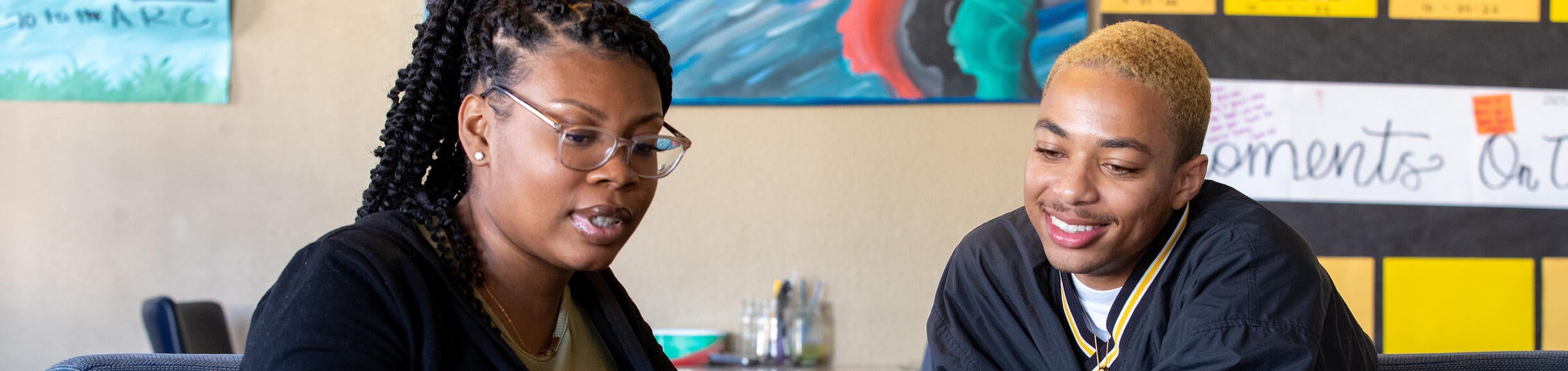 High school counselor meeting with a student