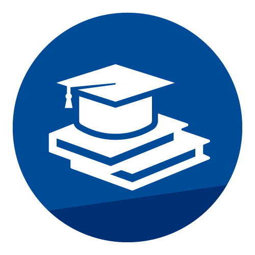A graduation cap sits on top of two closed books